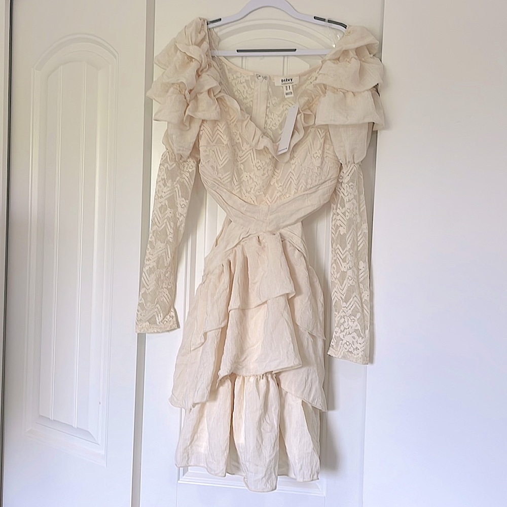 Priv lace sleeve dress with side cutouts
